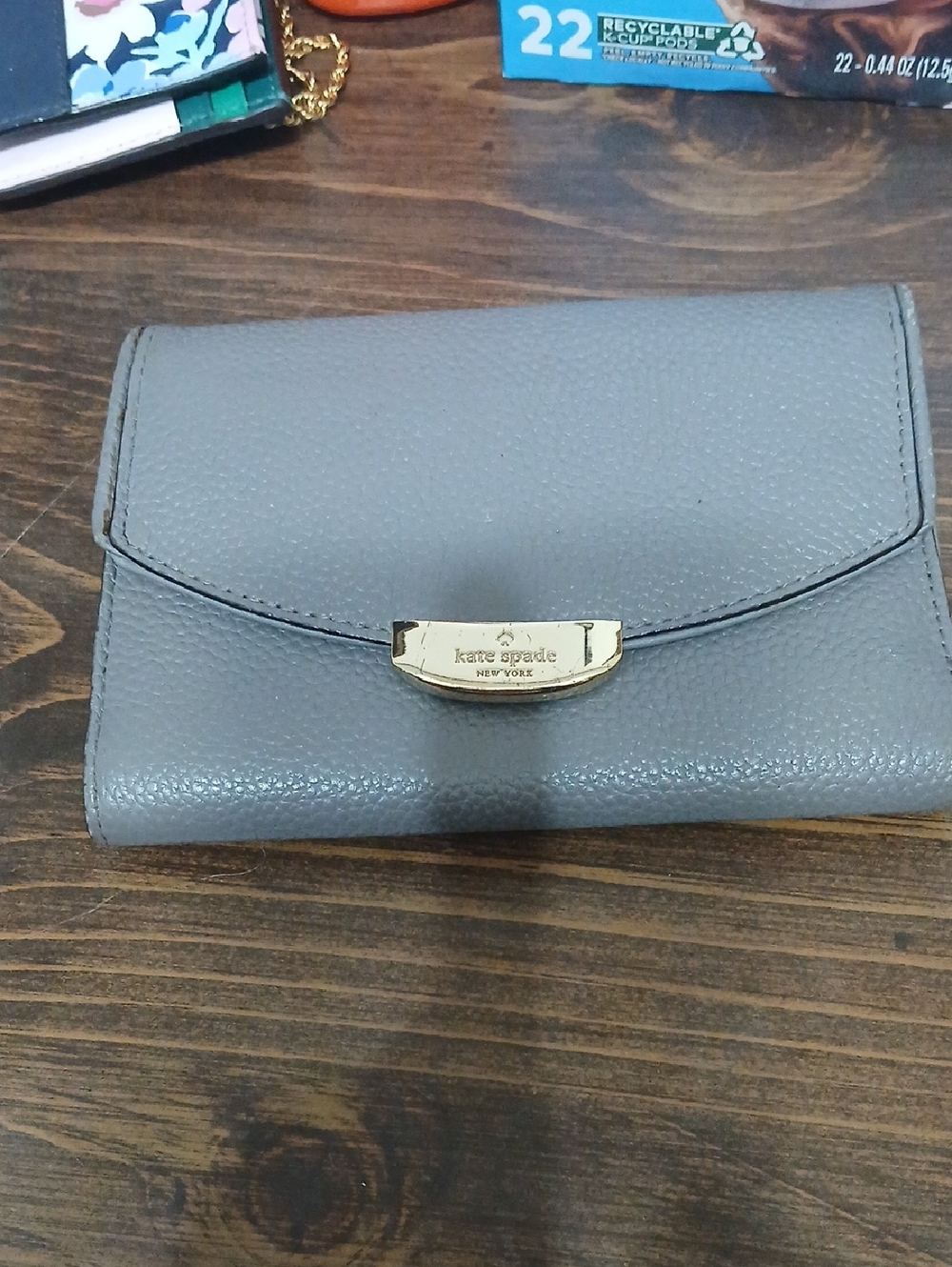 kate spade gray pebbled leather compact wallet with gold-tone logo clasp